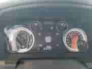 2023 Ram 1500 SLT with VIN 1C6RR7LGXPS595444, listed as a Copart auction lot 65205395 with 31,187 mi miles and Salvage title. Bid and sale history available at DreamBid. Image 9.