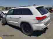 2016 Jeep Grand Cherokee 75th Anniversary with VIN 1C4RJFAG7GC470408, listed as a Copart auction lot 65464835 with 144,432 mi miles and Salvage title. Bid and sale history available at DreamBid. Image 2.