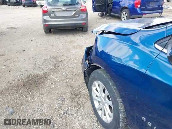 2021 Chevrolet Equinox LT z VIN 3GNAXUEV0ML306725, wystawiony jako IAAI lot #43047684 z przebiegiem 43 603 mil mil oraz . Historia ofert i sprzedaży dostępna na DreamBid. Obrazek 6.