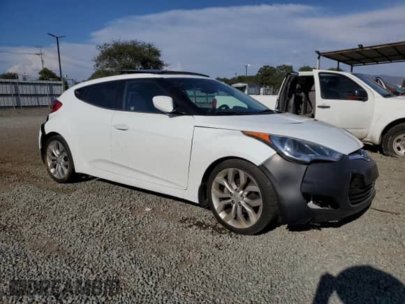 2012 Hyundai Veloster w/Black Int z VIN KMHTC6AD1CU037673, wystawiony jako Copart lot #71550475 z przebiegiem 204 000 mil mil oraz Szkoda całkowita • Salvage title. Historia ofert i sprzedaży dostępna na DreamBid. Obrazek 4.