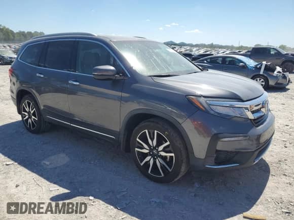 2019 Honda Pilot Touring 8-Passenger with VIN 5FNYF6H99KB033154, listed as a Copart auction lot 70672085 with 104,300 mi miles and Salvage title. Bid and sale history available at DreamBid. Image 4.
