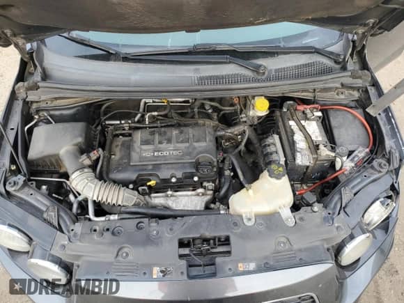 2012 Chevrolet Sonic LT z VIN 1G1JD5SB5C4218560, wystawiony jako Copart lot #75256184 z przebiegiem 182 339 mil mil oraz Szkoda całkowita • Salvage title. Historia ofert i sprzedaży dostępna na DreamBid. Obrazek 11.