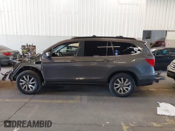 2020 Honda Pilot EX с VIN 5FNYF6H35LB065497, выставлен на аукционе IAAI как лот 42648826 с пробегом 68 504 миль миль и . История ставок и продаж доступна на DreamBid. Изображение 15.