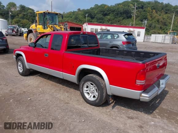 2004 Dodge Dakota SLT with VIN 1D7GL42K94S711742, listed as a IAAI auction lot 43113501 with Not provided miles and . Bid and sale history available at DreamBid. Image 3.