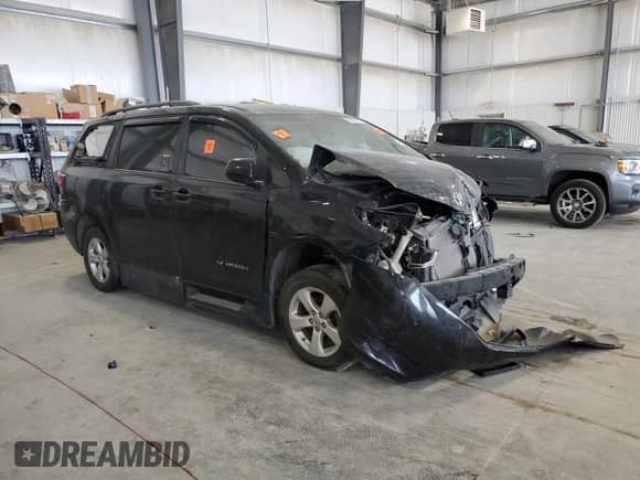 2015 Toyota Sienna LE with VIN 5TDKK3DC7FS624540, listed as a Copart auction lot 70029915 with Not provided miles and Salvage title. Bid and sale history available at DreamBid. Image 4.