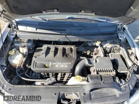 2012 Dodge Journey American Value с VIN 3C4PDCAB9CT204243, выставлен на аукционе Copart как лот 71920445 с пробегом 149 336 миль миль и Списание • Salvage title. История ставок и продаж доступна на DreamBid. Изображение 12.