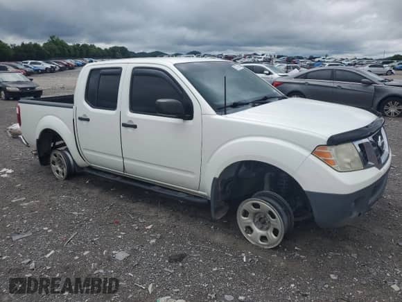 2014 Nissan Frontier S with VIN 1N6AD0EV5EN737053, listed as a Copart auction lot 52776645 with 201,210 mi miles and Salvage title. Bid and sale history available at DreamBid. Image 4.