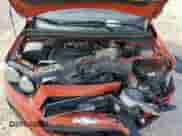 2012 Chevrolet Sonic LT z VIN 1G1JD6SHXC4125785, wystawiony jako Copart lot #89107785 z przebiegiem 118 059 mil mil oraz Szkoda całkowita • Salvage title. Historia ofert i sprzedaży dostępna na DreamBid. Obrazek 13.