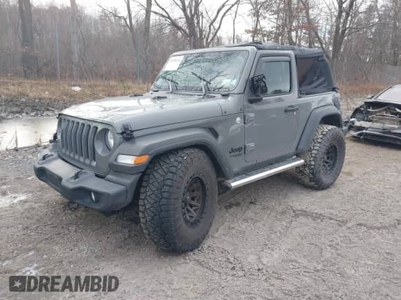 2021 Jeep Wrangler Sport S with VIN 1C4GJXAN9MW768559, listed as a IAAI auction lot 41238254 with 18,191 mi miles and . Bid and sale history available at DreamBid. Image 17.