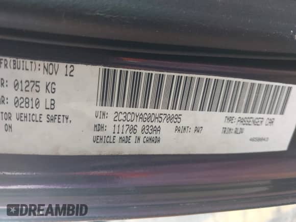 2013 Dodge Challenger SXT with VIN 2C3CDYAG0DH570095, listed as a IAAI auction lot 42282130 with 191,728 mi miles and . Bid and sale history available at DreamBid. Image 9.