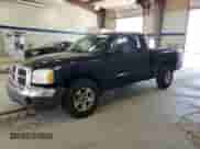 2005 Dodge Dakota SLT with VIN 1D7HE42K65S133244, listed as a Copart auction lot 65737025 with 171,325 mi miles and Salvage title. Bid and sale history available at DreamBid. Image 1.