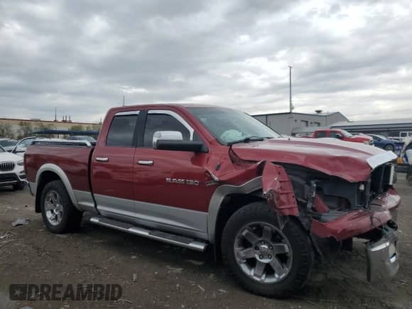 2012 Ram 1500 Laramie with VIN 1C6RD7JT9CS190989, listed as a Copart auction lot 55823795 with 131,070 mi miles and Salvage title. Bid and sale history available at DreamBid. Image 4.