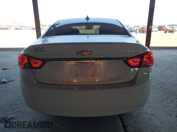 2018 Chevrolet Impala LT with VIN 1G1105S33JU104297, listed as a Copart auction lot 83801935 with 68,295 mi miles and Salvage title. Bid and sale history available at DreamBid. Image 6.