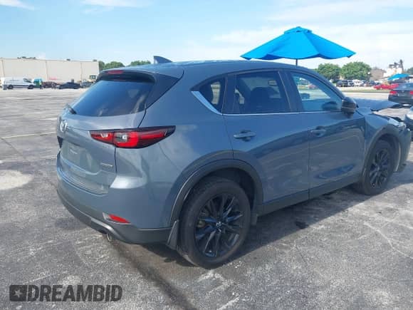 2024 Mazda CX-5 S Preferred z VIN JM3KFBCMXR0353299, wystawiony jako IAAI lot #42919399 z przebiegiem 56 673 mil mil oraz . Historia ofert i sprzedaży dostępna na DreamBid. Obrazek 4.
