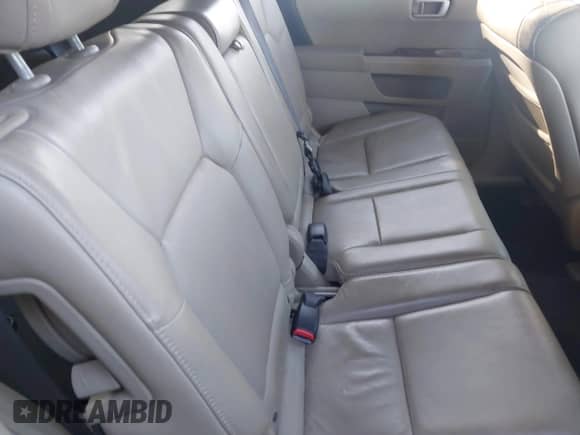 2009 Honda Pilot Touring with VIN 5FNYF48979B007005, listed as a IAAI auction lot 43454497 with 128,268 mi miles and . Bid and sale history available at DreamBid. Image 8.