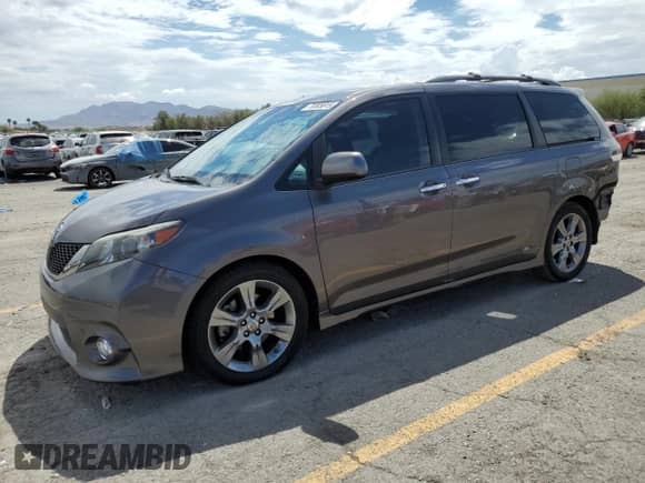 2013 Toyota Sienna SE with VIN 5TDXK3DCXDS347384, listed as a Copart auction lot 70305815 with 94,648 mi miles and Salvage title. Bid and sale history available at DreamBid. Image 1.