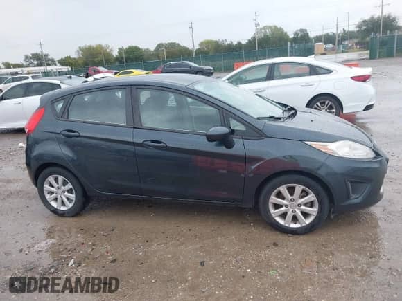 2011 Ford Fiesta SE with VIN 3FADP4EJ9BM156808, listed as a IAAI auction lot 43412420 with 78,092 mi miles and . Bid and sale history available at DreamBid. Image 13.