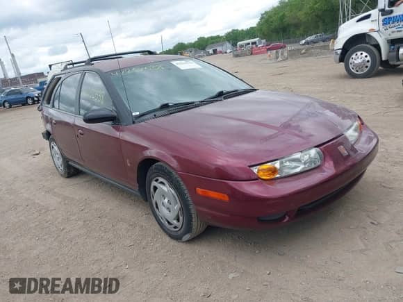 2001 Saturn SW with VIN 1G8ZJ82761Z275070, listed as a IAAI auction lot 42252538 with 257,485 mi miles and . Bid and sale history available at DreamBid. Image 1.