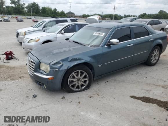 2005 Chrysler 300 300C AWD with VIN 2C3AK63H15H611519, listed as a Copart auction lot 63765655 with 168,036 mi miles and Salvage title. Bid and sale history available at DreamBid. Image 1.