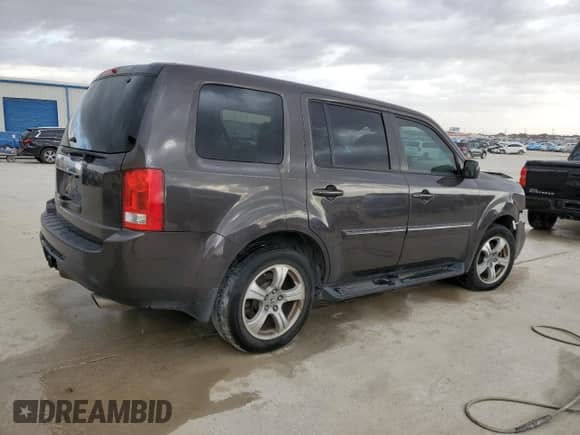2014 Honda Pilot EX-L with VIN 5FNYF3H68EB001658, listed as a Copart auction lot 47936035 with 197,431 mi miles and Salvage title. Bid and sale history available at DreamBid. Image 3.