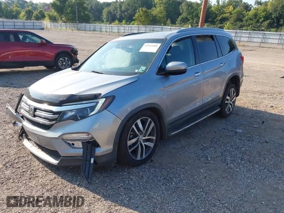 2017 Honda Pilot Elite with VIN 5FNYF6H09HB064057, listed as a IAAI auction lot 42933904 with 51,184 mi miles and . Bid and sale history available at DreamBid. Image 2.