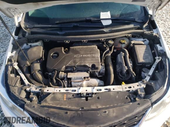 2017 Chevrolet Cruze LS z VIN 1G1BB5SM0H7153599, wystawiony jako Copart lot #83099414 z przebiegiem 161 527 mil mil oraz Nie do naprawy • Non repairable. Historia ofert i sprzedaży dostępna na DreamBid. Obrazek 7.