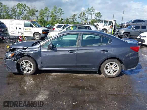 2017 Subaru Impreza Premium with VIN 4S3GKAD60H3623416, listed as a IAAI auction lot 43396228 with 106,514 mi miles and . Bid and sale history available at DreamBid. Image 14.