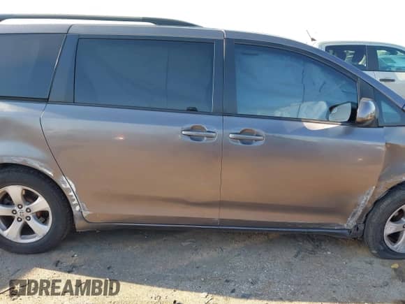 2017 Toyota Sienna LE with VIN 5TDKZ3DC6HS808088, listed as a IAAI auction lot 43186652 with 239,768 mi miles and . Bid and sale history available at DreamBid. Image 13.