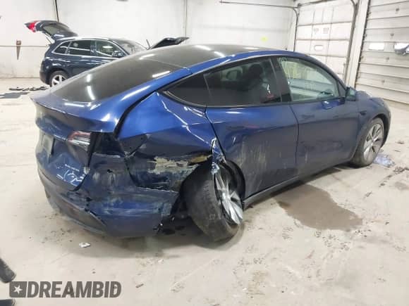 2021 Tesla Model Y Long Range with VIN 5YJYGDEE2MF159264, listed as a IAAI auction lot 43167588 with 83,012 mi miles and . Bid and sale history available at DreamBid. Image 4.