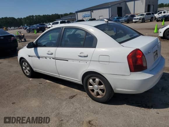 2006 Hyundai Accent GLS z VIN KMHCN46C66U051569, wystawiony jako Copart lot #69154735 z przebiegiem 210 214 mil mil oraz Czysty tytuł • Clean title. Historia ofert i sprzedaży dostępna na DreamBid. Obrazek 2.
