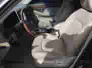 2004 Hyundai XG z VIN KMHFU45EX4A300828, wystawiony jako Copart lot #43624725 z przebiegiem 107 618 mil mil oraz Szkoda całkowita • Salvage title. Historia ofert i sprzedaży dostępna na DreamBid. Obrazek 7.