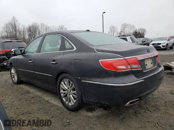 2011 Hyundai Azera Limited с VIN KMHFC4DF7BA532412, выставлен на аукционе Copart как лот 49897054 с пробегом 228 818 миль миль и На запчасти • Non repairable. История ставок и продаж доступна на DreamBid. Изображение 2.