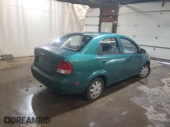 2004 Chevrolet Aveo LS with VIN KL1TJ52604B148255, listed as a Copart auction lot 52167815 with 67,162 mi miles and Clean title. Bid and sale history available at DreamBid. Image 3.