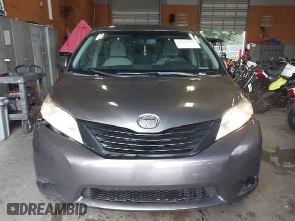 2014 Toyota Sienna LE AAS with VIN 5TDKK3DC8ES487963, listed as a IAAI auction lot 43192797 with 229,003 mi miles and . Bid and sale history available at DreamBid. Image 12.