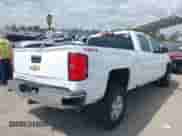 2016 Chevrolet Silverado 1500 LT with VIN 1GCUKREC1GF145767, listed as a IAAI auction lot 41869630 with 133,407 mi miles and . Bid and sale history available at DreamBid. Image 4.