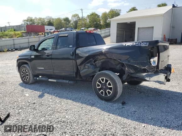 2014 Toyota Tundra SR5 с VIN 5TFUY5F12EX405170, выставлен на аукционе Copart как лот 80782245 с пробегом 111 860 миль миль и Списание • Salvage title. История ставок и продаж доступна на DreamBid. Изображение 2.