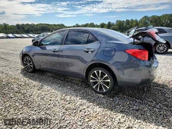 2019 Toyota Corolla LE z VIN 5YFBURHE4KP857447, wystawiony jako Copart lot #70769985 z przebiegiem 104 352 mil mil oraz Szkoda całkowita • Salvage title. Historia ofert i sprzedaży dostępna na DreamBid. Obrazek 2.