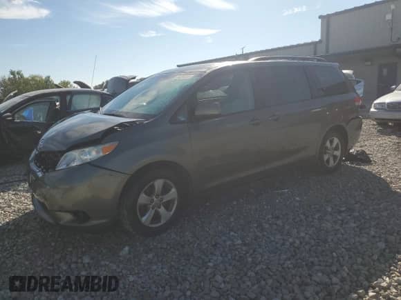 2012 Toyota Sienna LE with VIN 5TDKK3DC4CS179802, listed as a Copart auction lot 84264155 with 241,326 mi miles and Clean title. Bid and sale history available at DreamBid. Image 1.