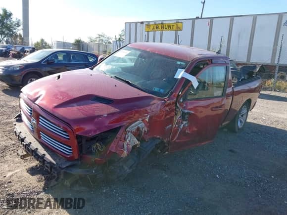 2014 Ram 1500 Sport with VIN 1C6RR7HT5ES369976, listed as a IAAI auction lot 43381115 with 124,357 mi miles and . Bid and sale history available at DreamBid. Image 2.