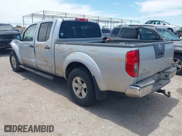 2012 Nissan Frontier SV with VIN 1N6AD0FV6CC454376, listed as a IAAI auction lot 42300882 with 255,186 mi miles and . Bid and sale history available at DreamBid. Image 3.