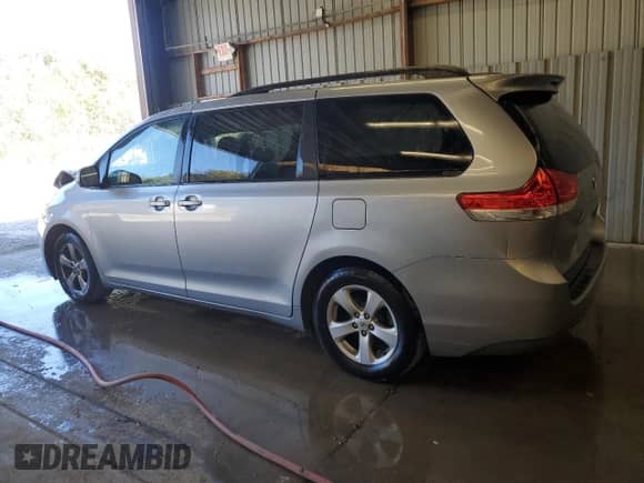 2014 Toyota Sienna LE with VIN 5TDKK3DC7ES490837, listed as a Copart auction lot 84757405 with 151,384 mi miles and Salvage title. Bid and sale history available at DreamBid. Image 2.