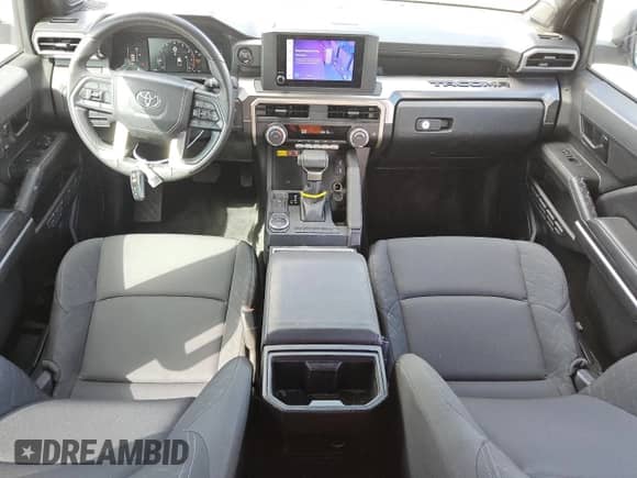 2024 Toyota Tacoma SR5 with VIN 3TYKB5FNXRT009175, listed as a Copart auction lot 84457005 with 3,960 mi miles and Clean title. Bid and sale history available at DreamBid. Image 8.