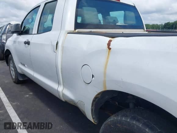 2012 Toyota Tundra z VIN 5TFRU5F10CX026554, wystawiony jako IAAI lot #43010233 z przebiegiem 221 656 mil mil oraz . Historia ofert i sprzedaży dostępna na DreamBid. Obrazek 19.