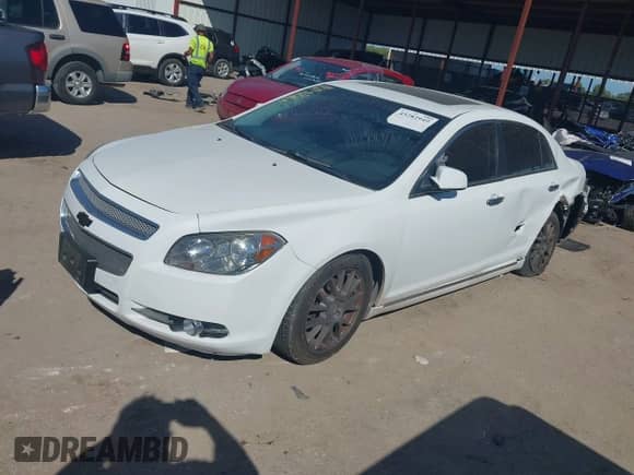 2012 Chevrolet Malibu LTZ z VIN 1G1ZG5E7XCF267663, wystawiony jako IAAI lot #43282949 z przebiegiem 161 832 mil mil oraz . Historia ofert i sprzedaży dostępna na DreamBid. Obrazek 17.