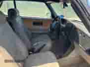 1994 Saab 900 z VIN YS3AK75E2R7000350, wystawiony jako Copart lot #69645675 z przebiegiem 87 484 mil mil oraz Czysty tytuł • Clean title. Historia ofert i sprzedaży dostępna na DreamBid. Obrazek 5.