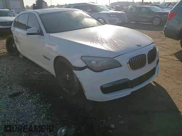 2012 BMW 7 Series 750Li xDrive z VIN WBAKC8C53CC434922, wystawiony jako Copart lot #80517035 z przebiegiem 153 422 mil mil oraz Czysty tytuł • Clean title. Historia ofert i sprzedaży dostępna na DreamBid. Obrazek 13.
