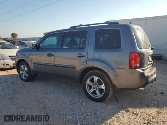 2014 Honda Pilot EX-L with VIN 5FNYF3H59EB007010, listed as a Copart auction lot 80383335 with 251,810 mi miles and Salvage title. Bid and sale history available at DreamBid. Image 2.