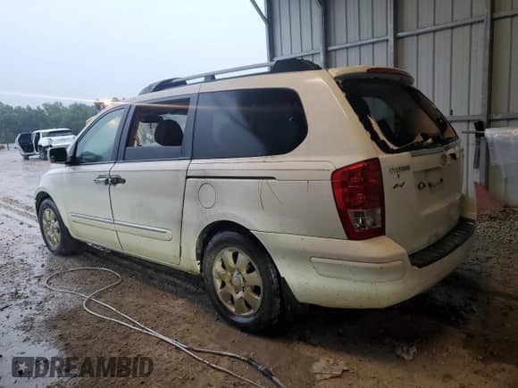 2007 Hyundai Entourage GLS with VIN KNDMC233776034423, listed as a Copart auction lot 61694055 with Not provided miles and Clean title. Bid and sale history available at DreamBid. Image 2.