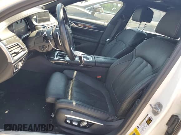 2017 BMW 7 Series 740e xDrive with VIN WBA7J2C34HG497678, listed as a Copart auction lot 55715124 with 40,852 mi miles and . Bid and sale history available at DreamBid. Image 7.