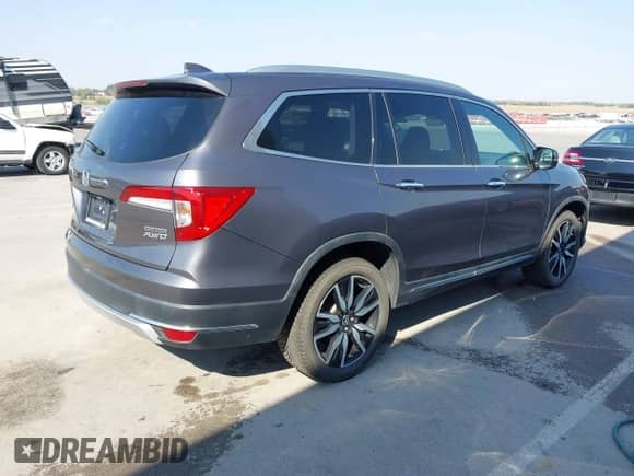 2019 Honda Pilot Touring 7-Passenger z VIN 5FNYF6H64KB003422, wystawiony jako IAAI lot #43340981 z przebiegiem 86 350 mil mil oraz . Historia ofert i sprzedaży dostępna na DreamBid. Obrazek 4.